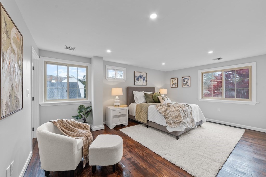 38 Wayside Lane Ashland, MA 01721 - Photo 21 of 40 a living room with furniture large window and wooden floor