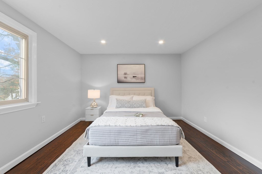 38 Wayside Lane Ashland, MA 01721 - Photo 26 of 40 a bedroom with a bed and a window