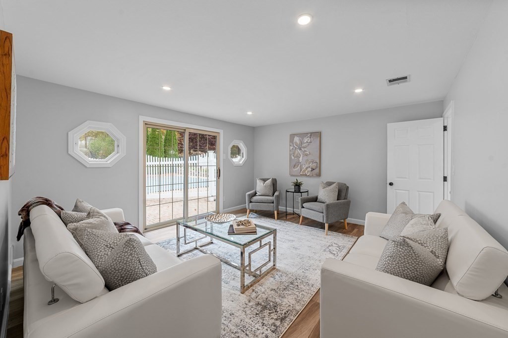 38 Wayside Lane Ashland, MA 01721 - Photo 33 of 40 a living room with furniture and a window
