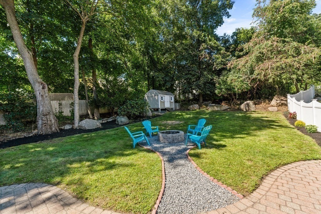 38 Wayside Lane Ashland, MA 01721 - Photo 39 of 40 a view of a garden with a patio