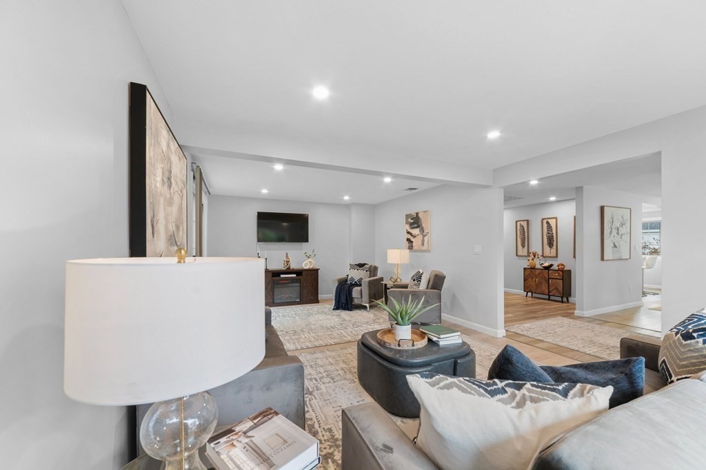 38 Wayside Lane Ashland, MA 01721 - Photo 5 of 40 a living room with furniture and wooden floor