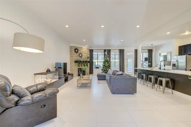 a living room with furniture and a table