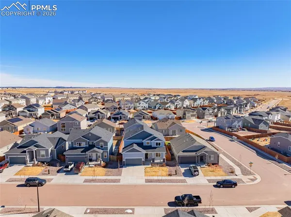 swimming pool view with a outdoor seating space