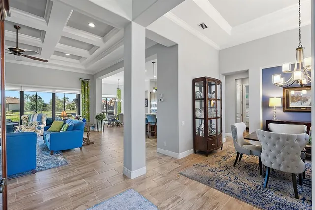 a bathroom with a granite countertop sink toilet a mirror and shower