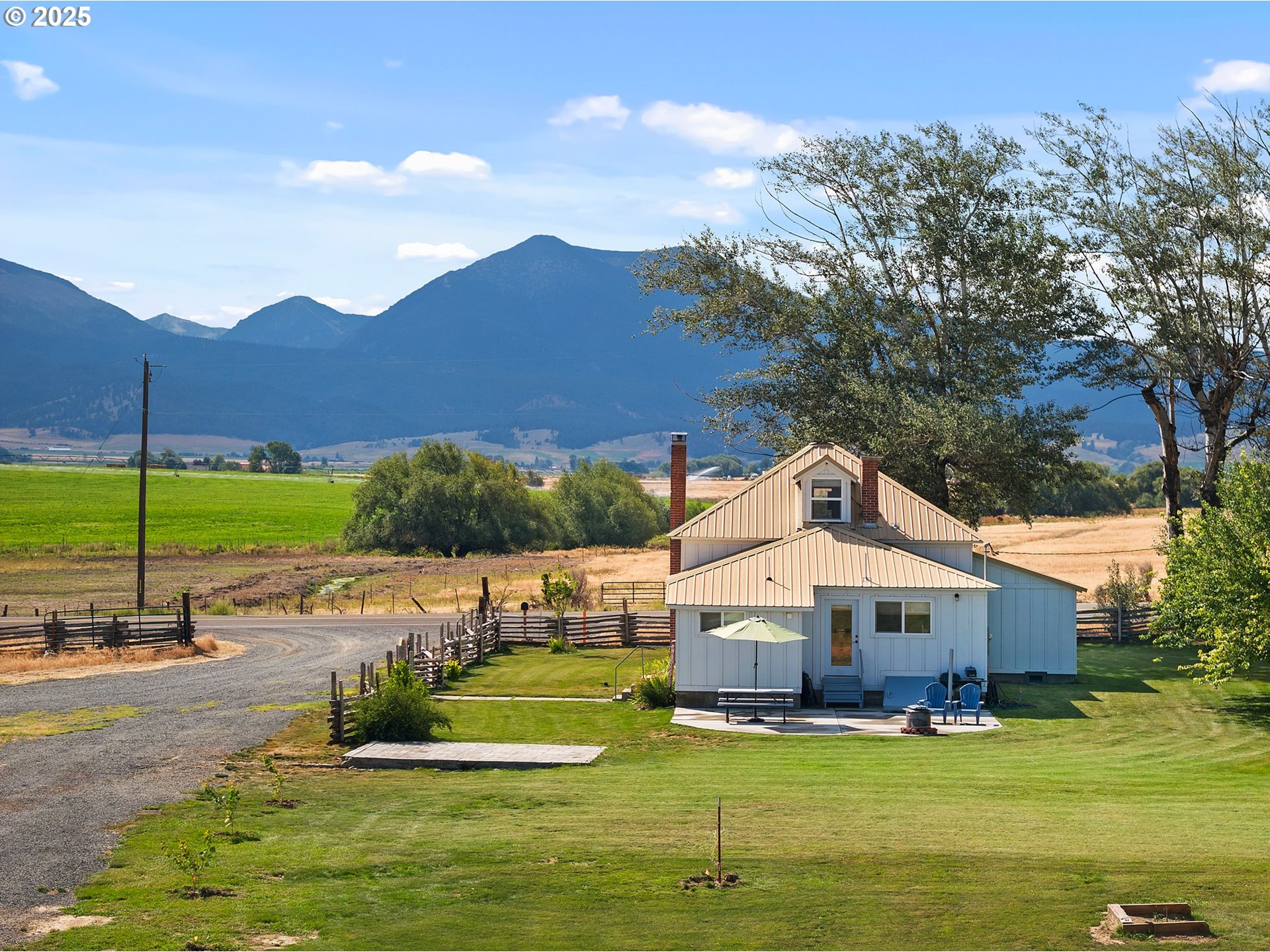 47219 Highway 30 Haines, OR 97833 - Photo 1 of 38 a aerial view of a house with a yard basket ball court and outdoor seating