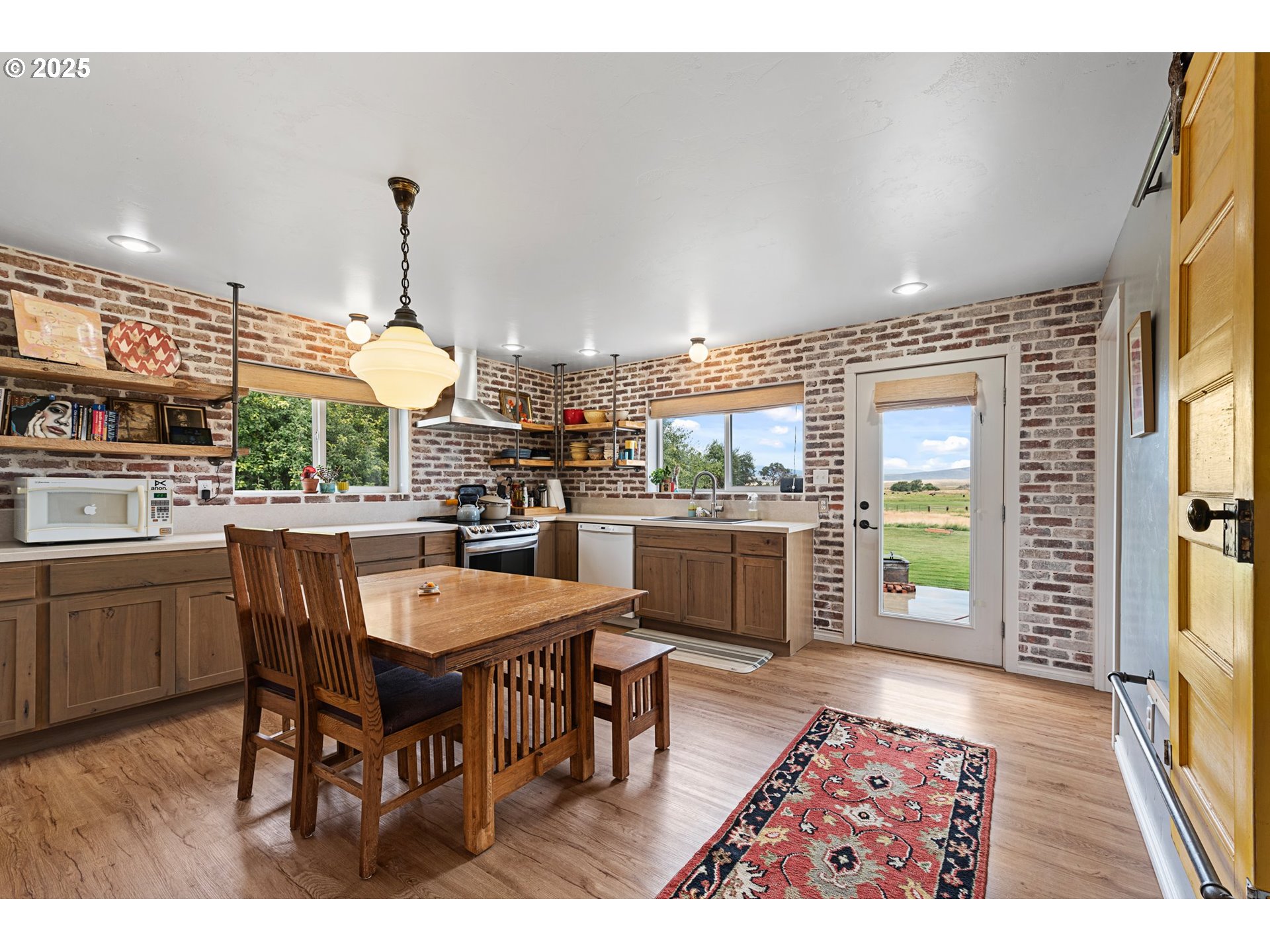 47219 Highway 30 Haines, OR 97833 - Photo 15 of 38 a open kitchen with a table and chairs in it