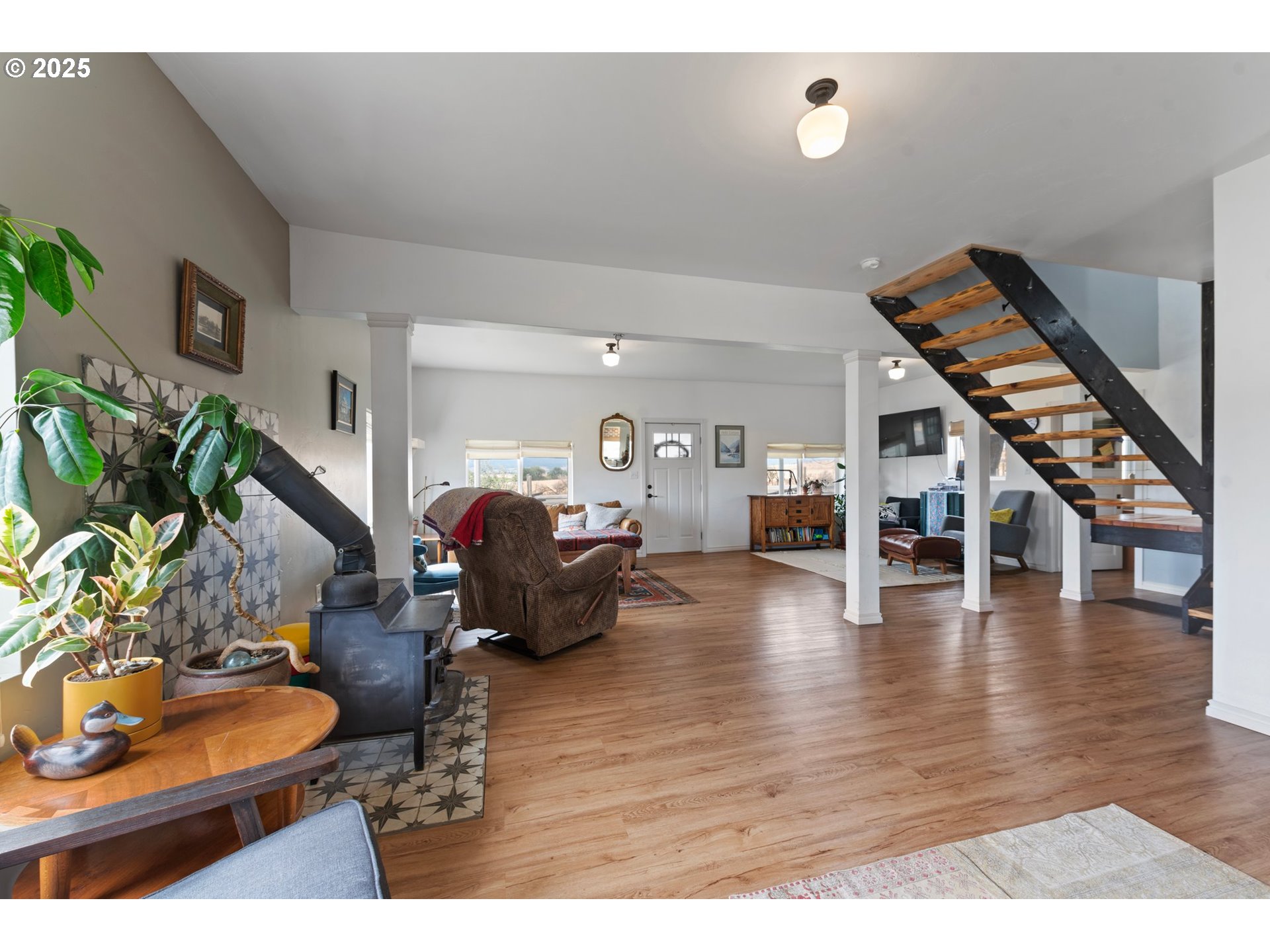 47219 Highway 30 Haines, OR 97833 - Photo 22 of 38 a living room with furniture and wooden floor
