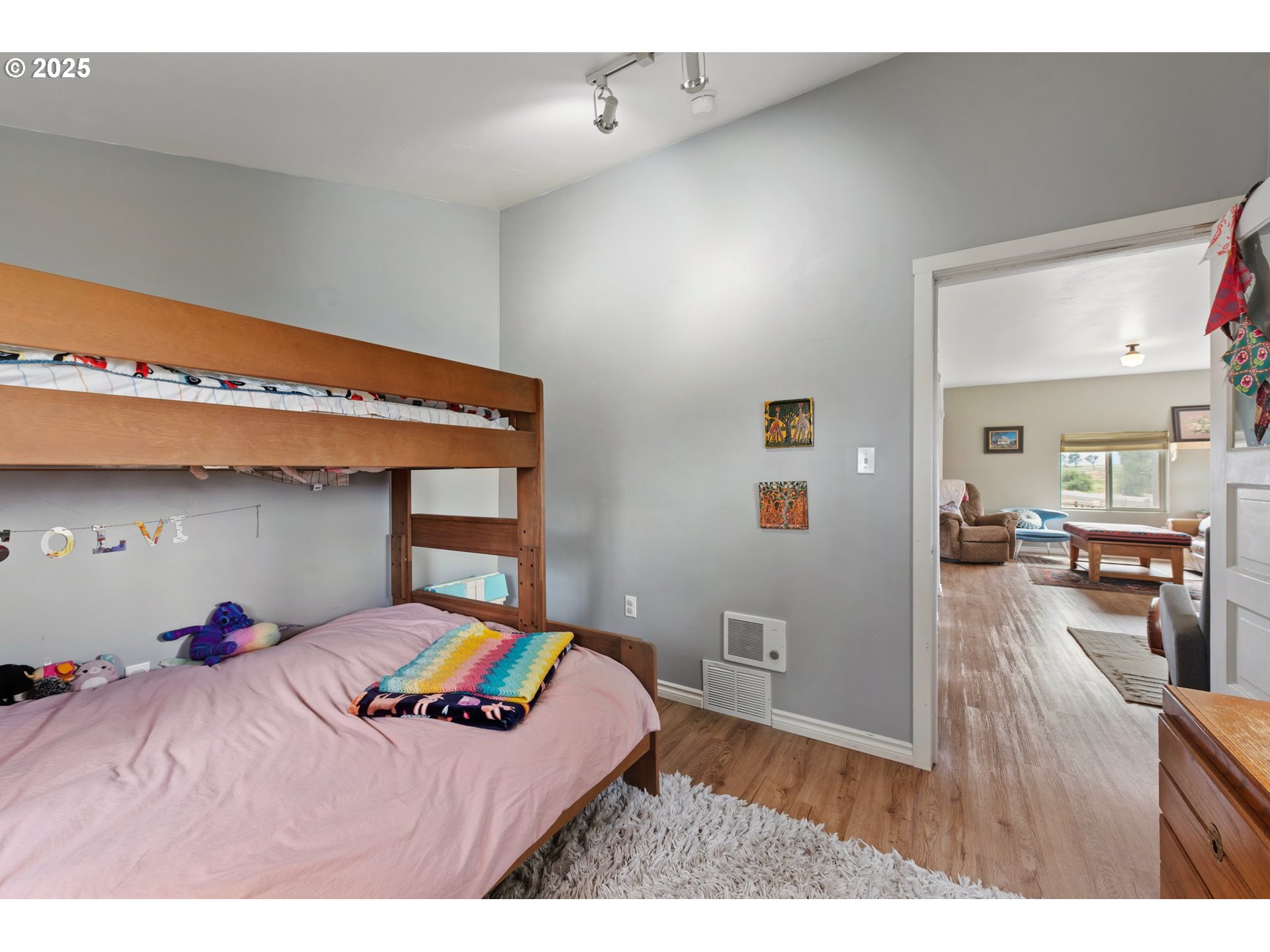 47219 Highway 30 Haines, OR 97833 - Photo 28 of 38 a bedroom with furniture and a wooden floor