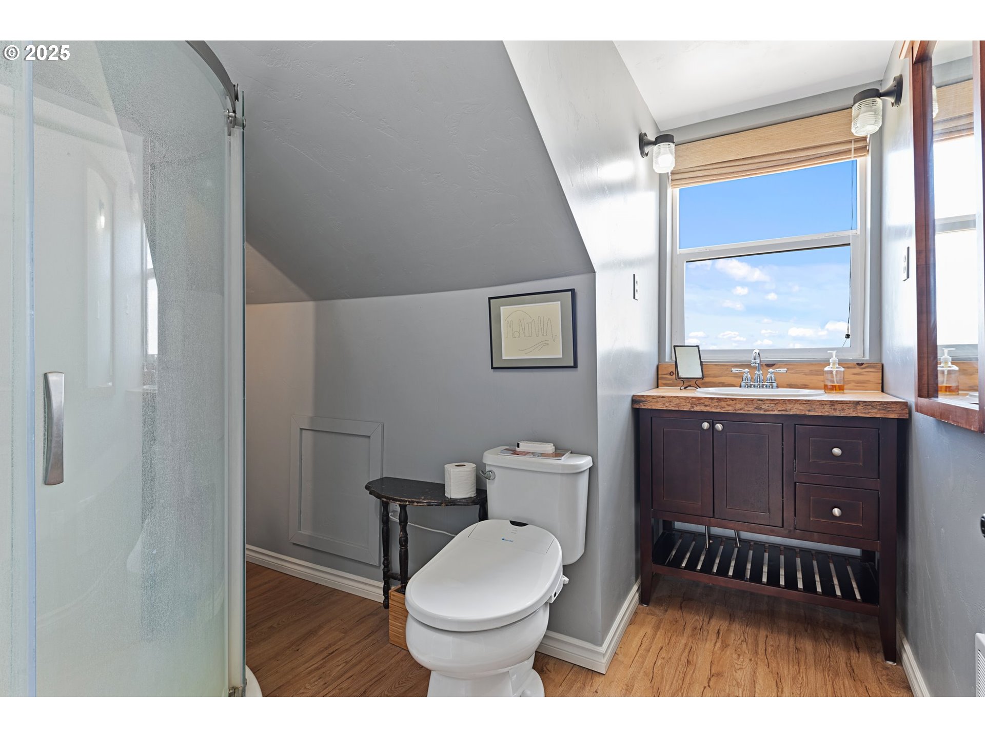 47219 Highway 30 Haines, OR 97833 - Photo 35 of 38 a bathroom with a toilet a sink and a large mirror