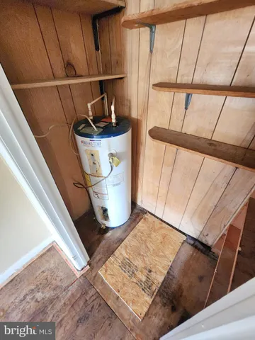 a view of a hallway with a white walls