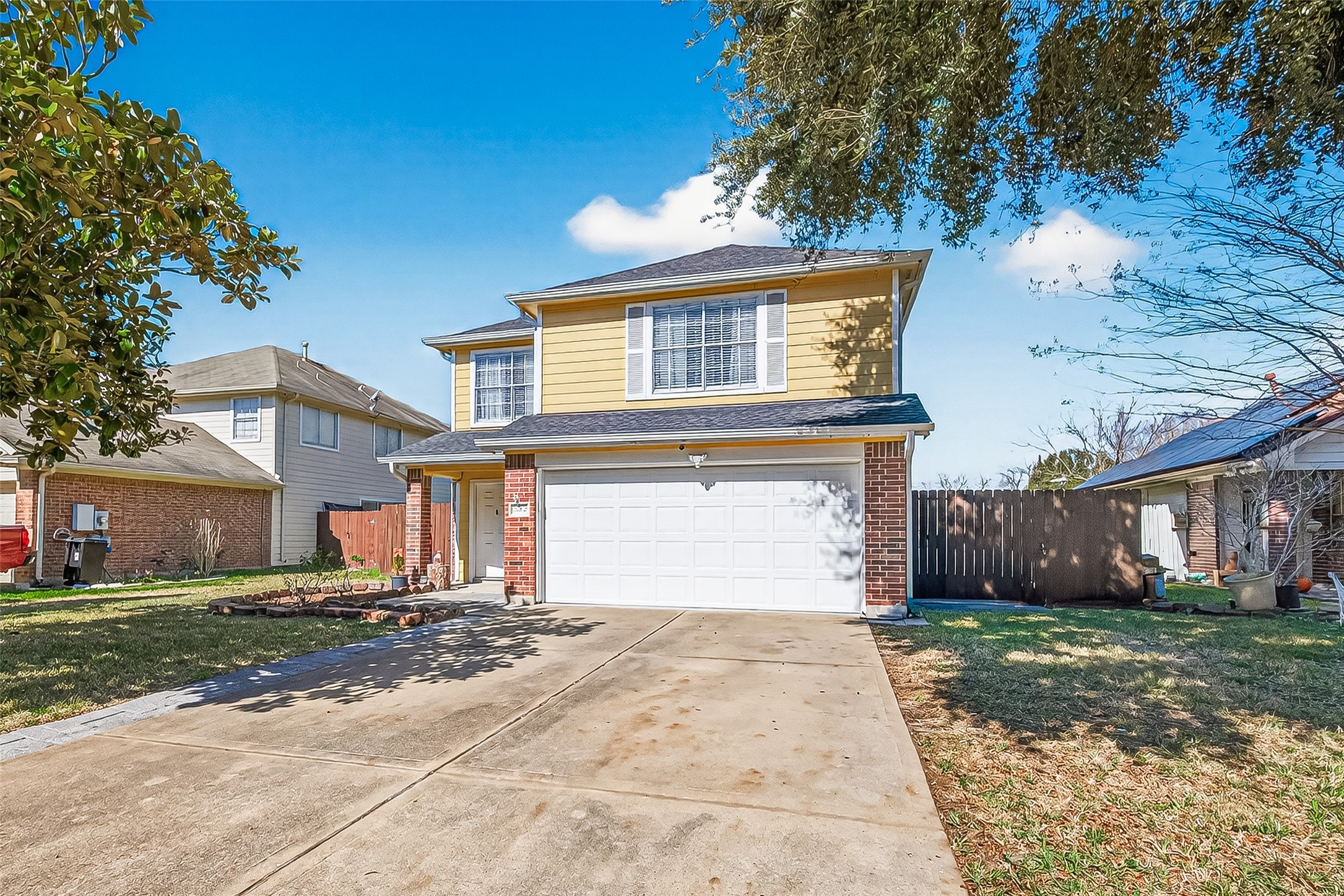 2202 Falling Oaks Road Houston, TX 77038 - Photo 3 of 47 A cozy front porch adds to its inviting curb appeal.