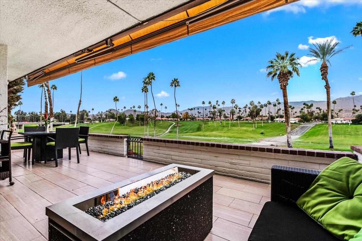 1 Cueta Drive Rancho Mirage, CA 92270 - Photo 1 of 39 a view of an chairs and tables in the patio