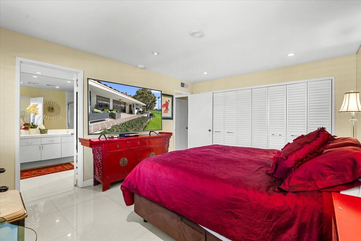 1 Cueta Drive Rancho Mirage, CA 92270 - Photo 18 of 39 a bed room with a bed and a dresser