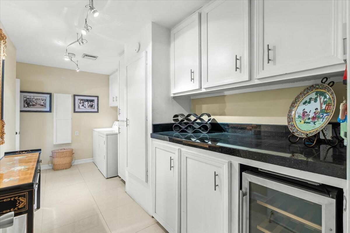 1 Cueta Drive Rancho Mirage, CA 92270 - Photo 22 of 39 a kitchen with granite countertop a sink and cabinets