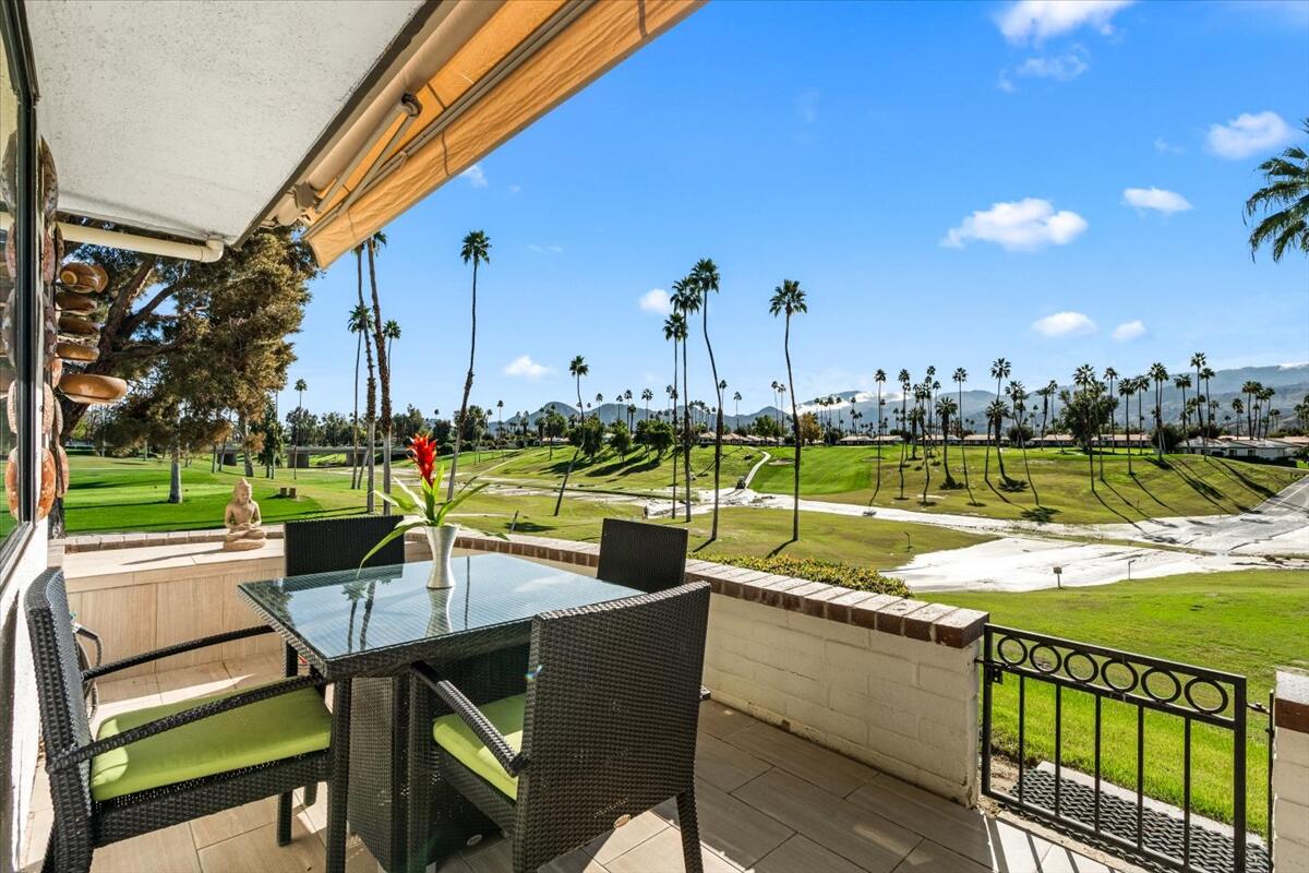 1 Cueta Drive Rancho Mirage, CA 92270 - Photo 24 of 39 a view of swimming pool with outdoor seating and yard