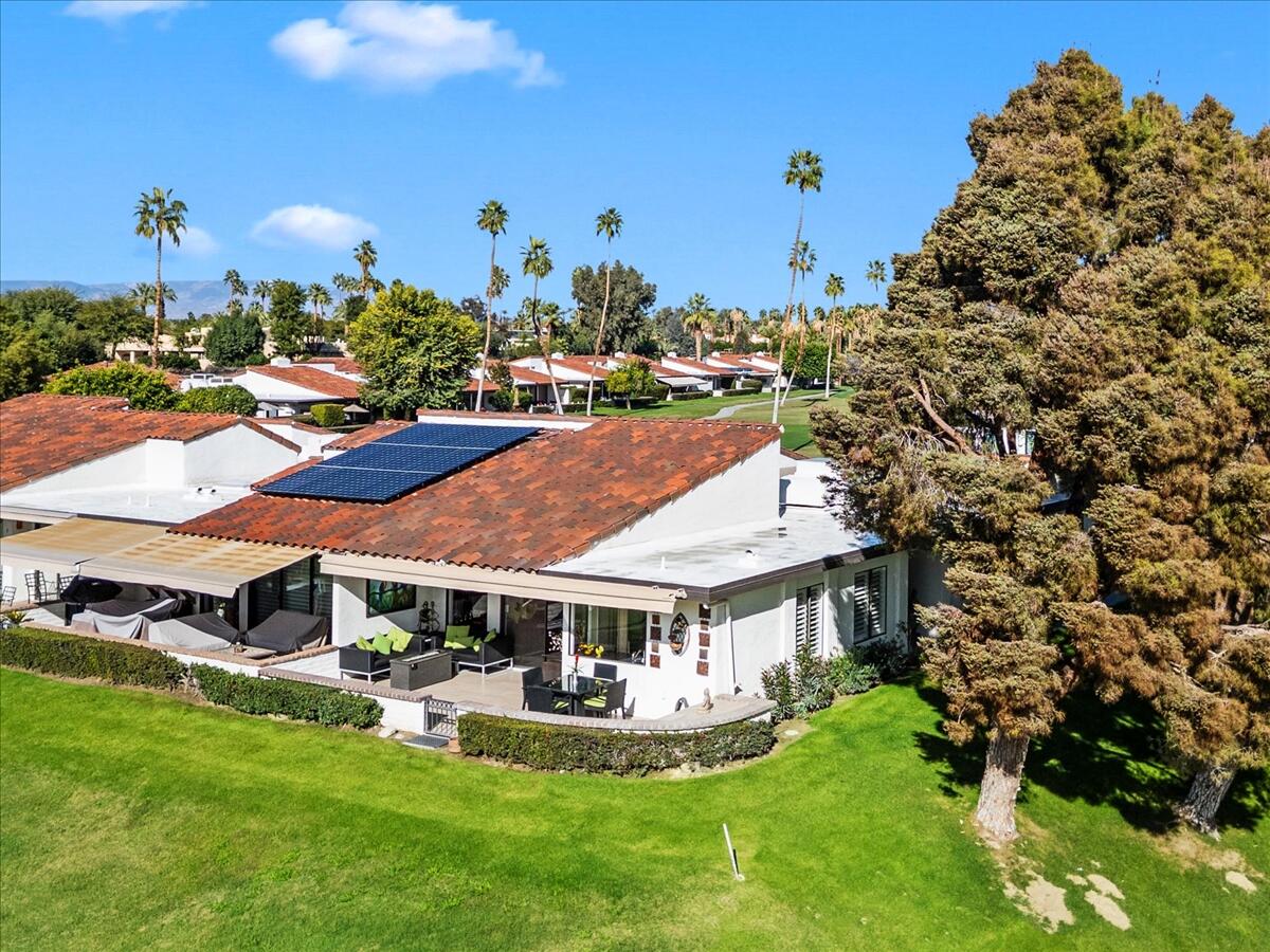 1 Cueta Drive Rancho Mirage, CA 92270 - Photo 30 of 39 a aerial view of a house with a garden and plants