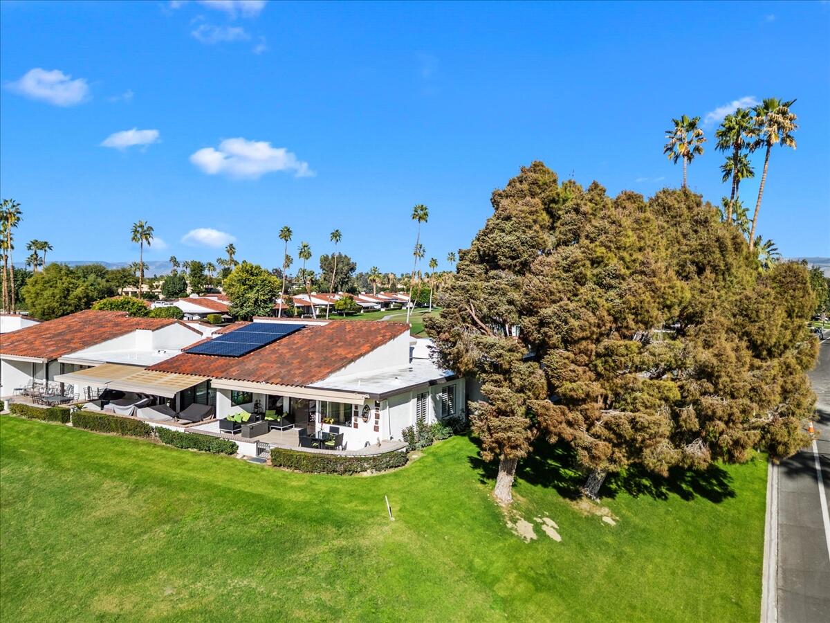 1 Cueta Drive Rancho Mirage, CA 92270 - Photo 32 of 39 a view of a house with a big yard
