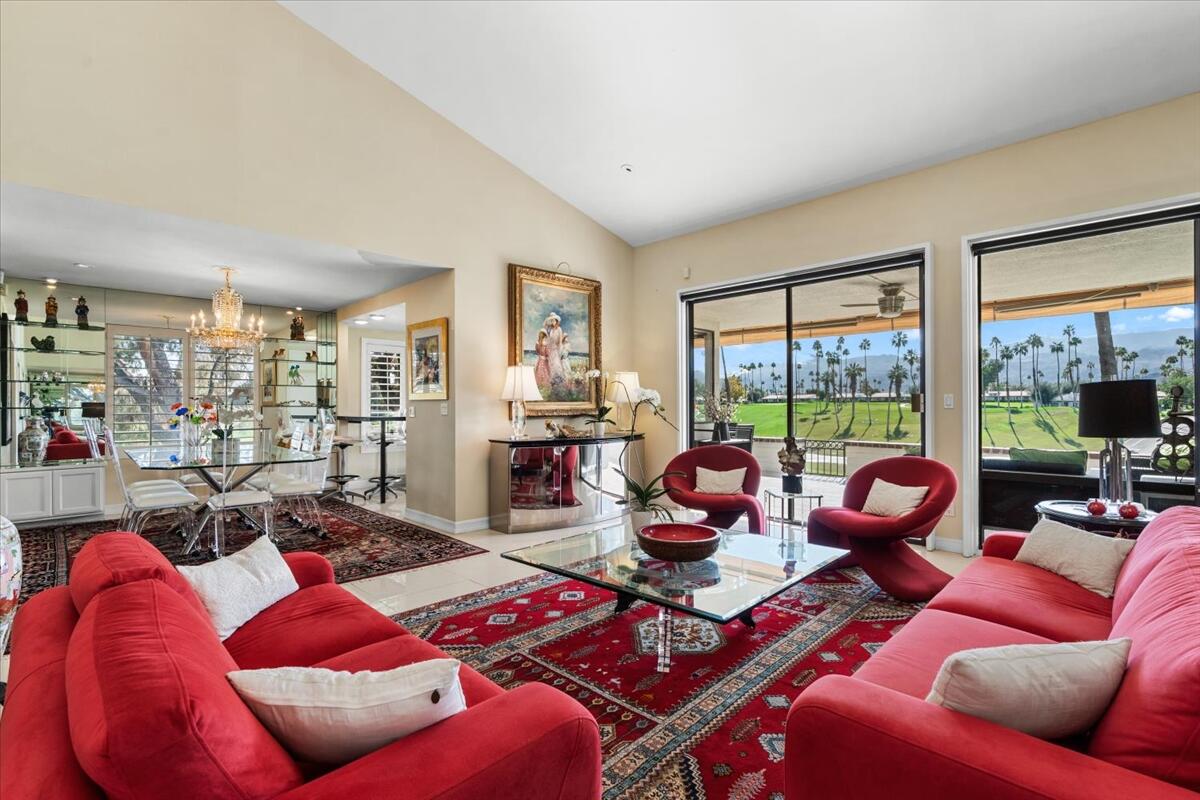 1 Cueta Drive Rancho Mirage, CA 92270 - Photo 7 of 39 a living room with furniture and a floor to ceiling window