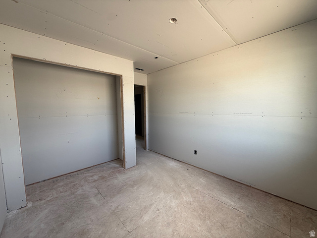 809 South 270th Street East, Unit 2 Smithfield, UT 84335 - Photo 13 of 23 Unfurnished bedroom featuring a closet