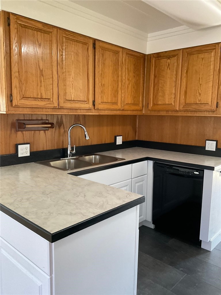 1180 Starlite Drive Nipomo, CA 93444 - Photo 11 of 35 a kitchen with a sink and cabinets