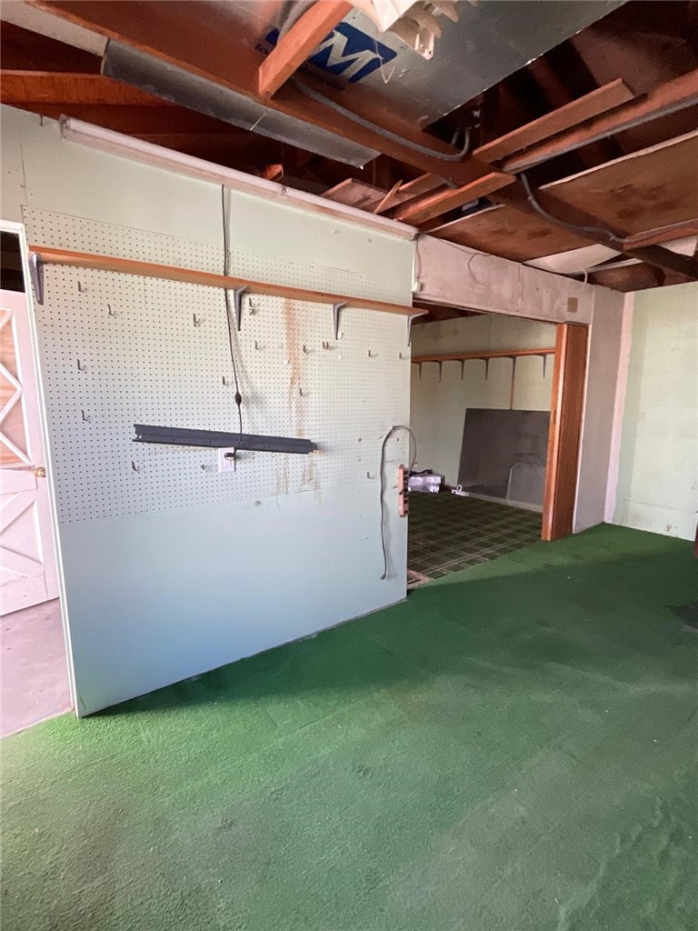 1180 Starlite Drive Nipomo, CA 93444 - Photo 24 of 35 a view of a room with racks on the wall