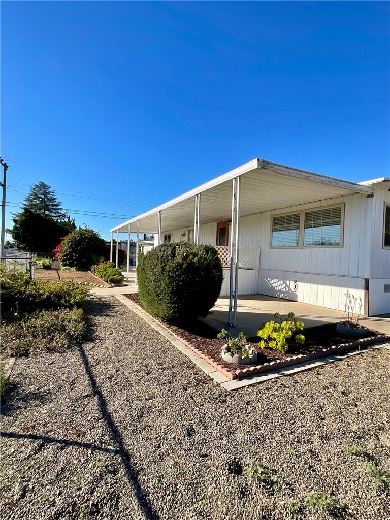 1180 Starlite Drive Nipomo, CA 93444 - Photo 26 of 35 a front view of a house with a yard