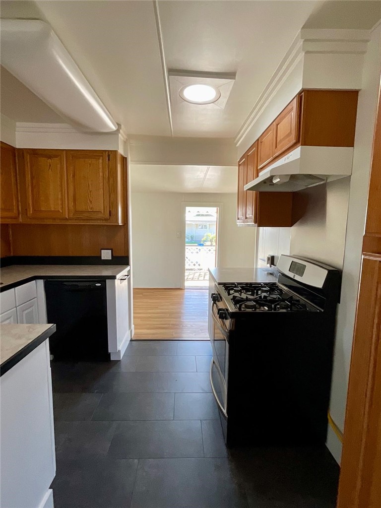 1180 Starlite Drive Nipomo, CA 93444 - Photo 10 of 35 a kitchen with a stove and a refrigerator