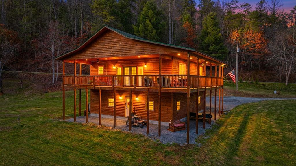 3234 Winding Stairs Road Topton, NC 28781 - Photo 1 of 32 a backyard of a house with table and chairs