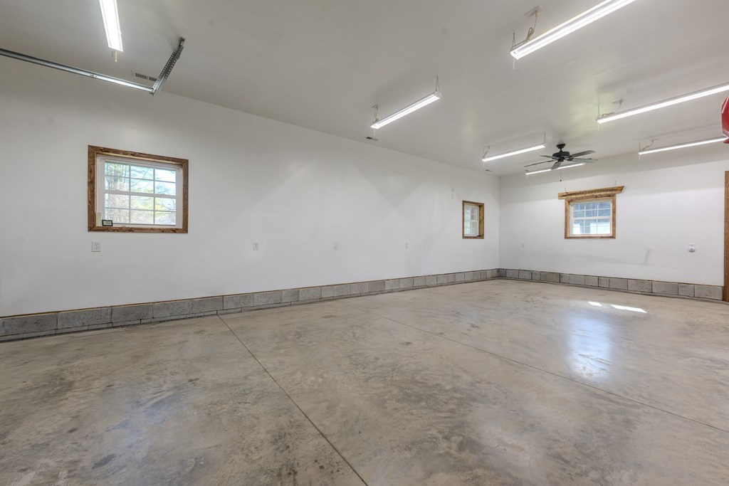 3234 Winding Stairs Road Topton, NC 28781 - Photo 20 of 32 an empty room with a empty space and windows