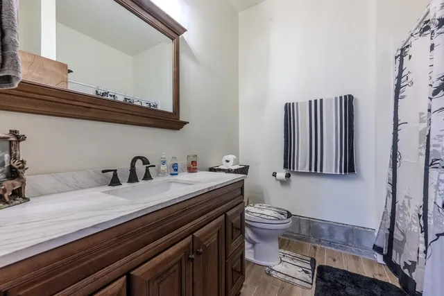 a utility room with a sink dryer and washer