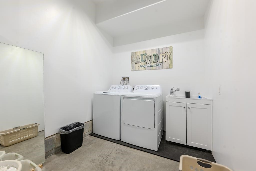 3234 Winding Stairs Road Topton, NC 28781 - Photo 22 of 32 a utility room with a sink dryer and washer