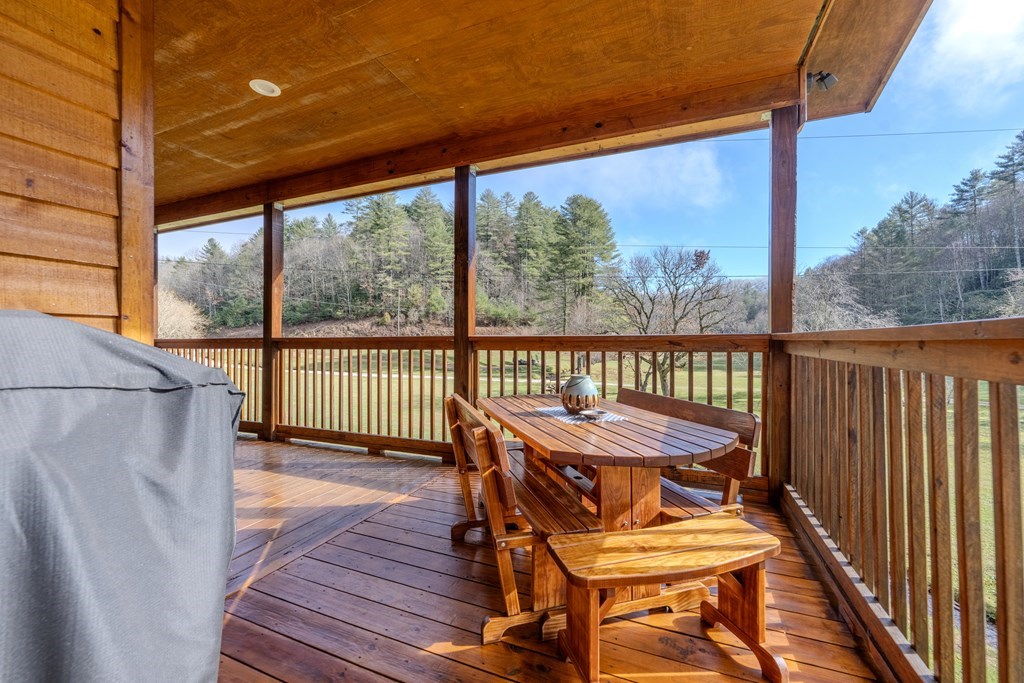 3234 Winding Stairs Road Topton, NC 28781 - Photo 25 of 32 a view of a balcony with furniture and wooden floor