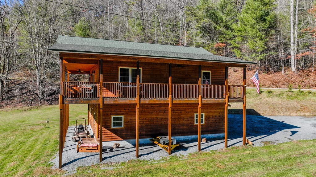 3234 Winding Stairs Road Topton, NC 28781 - Photo 30 of 32 a view of a backyard with a small cabin