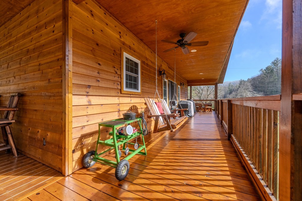 3234 Winding Stairs Road Topton, NC 28781 - Photo 5 of 32 a view of a patio with wooden floor