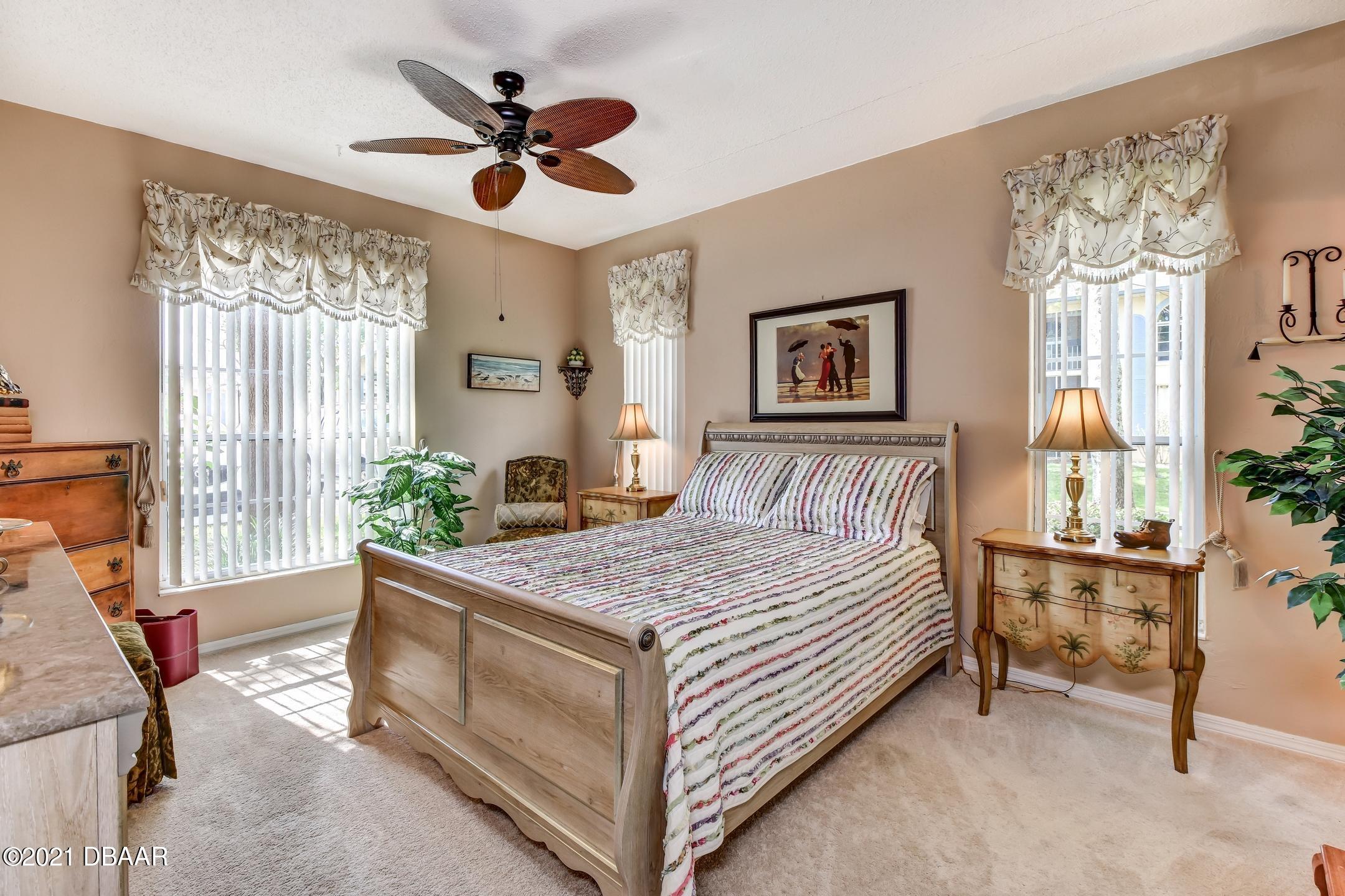 681 Wellington Station Boulevard, Unit 4 Ormond Beach, FL 32174 - Photo 11 of 27 14-Master Bedroom