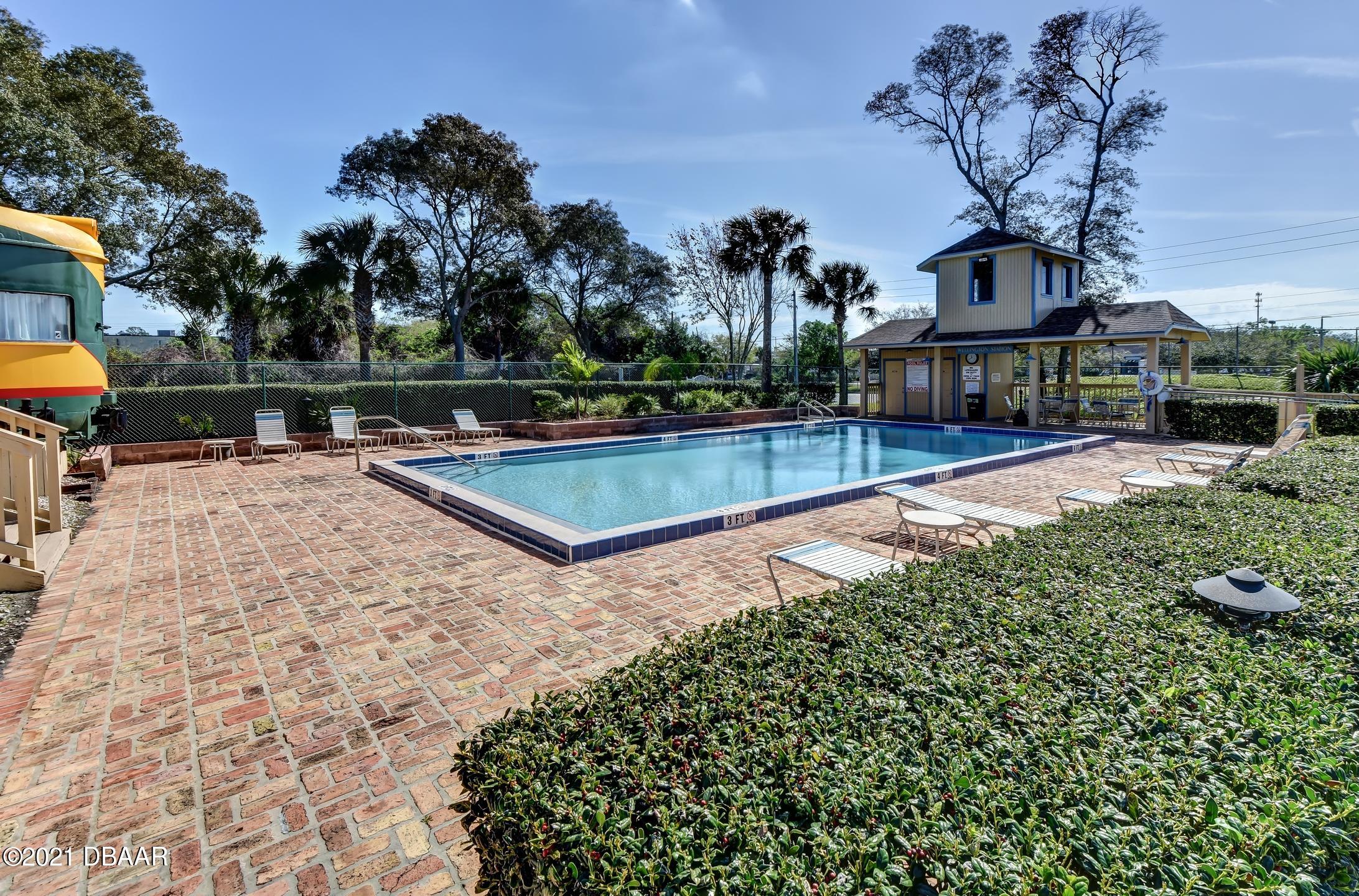 681 Wellington Station Boulevard, Unit 4 Ormond Beach, FL 32174 - Photo 24 of 27 25-Community Pool