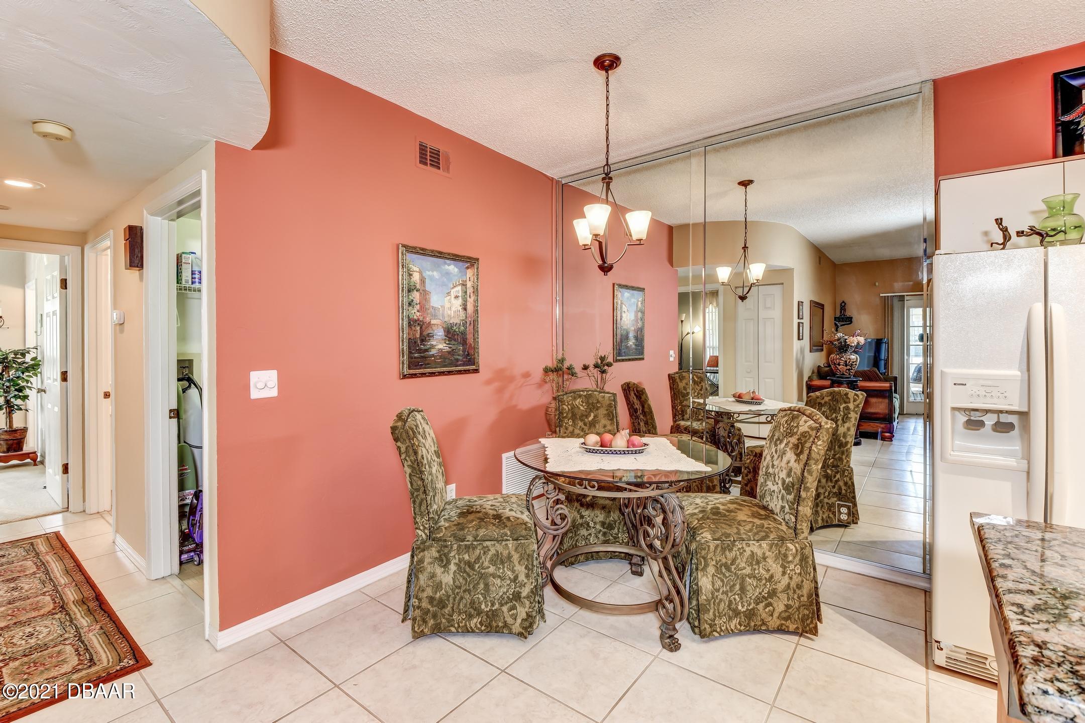 681 Wellington Station Boulevard, Unit 4 Ormond Beach, FL 32174 - Photo 6 of 27 8-Dining Area