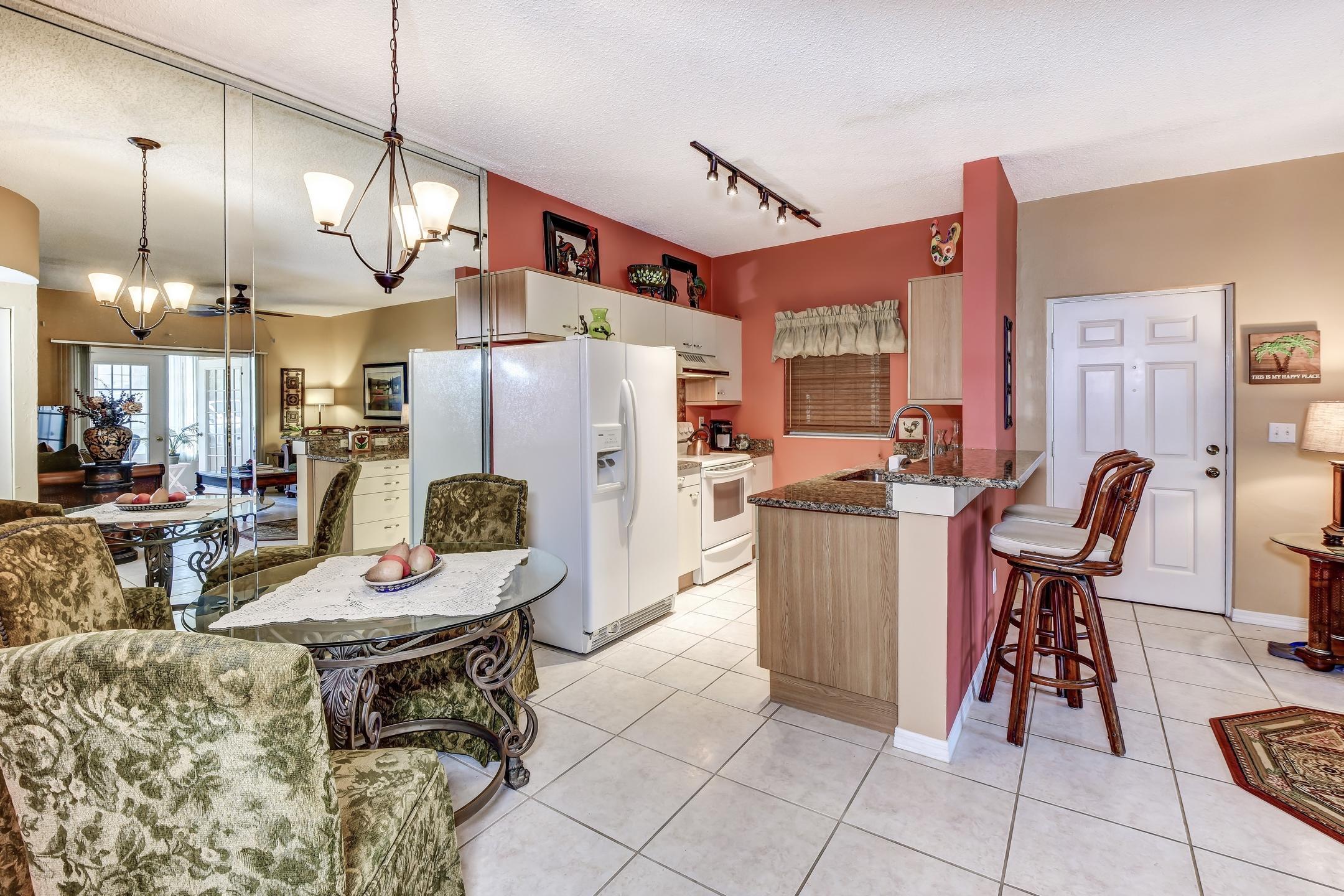 681 Wellington Station Boulevard, Unit 4 Ormond Beach, FL 32174 - Photo 7 of 27 9-Dining AreaKitchen