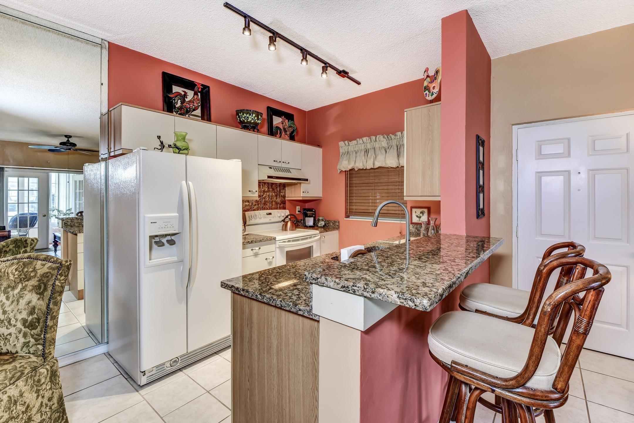 681 Wellington Station Boulevard, Unit 4 Ormond Beach, FL 32174 - Photo 8 of 27 10-Kitchen Area