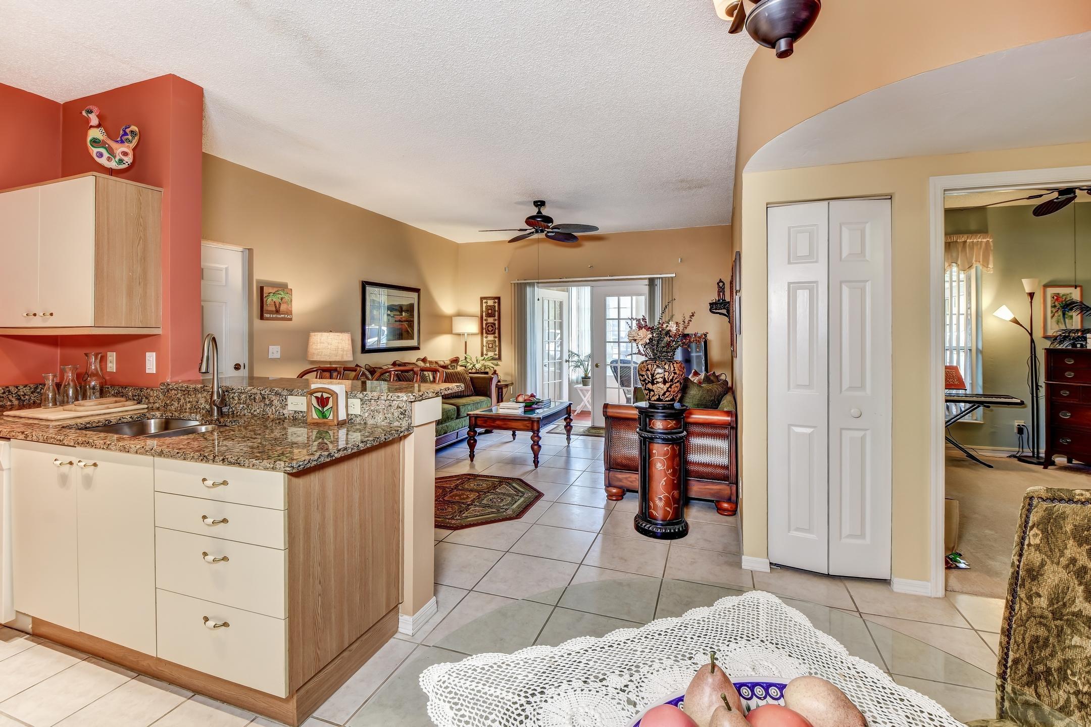 681 Wellington Station Boulevard, Unit 4 Ormond Beach, FL 32174 - Photo 9 of 27 11-Kitchen Living Room