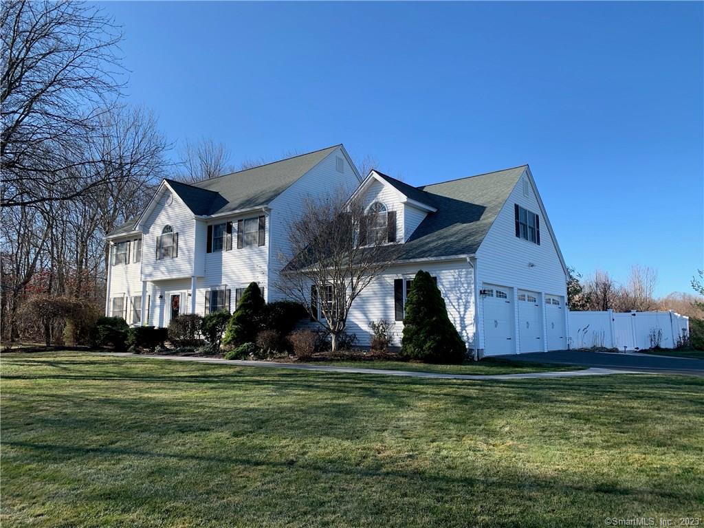 297 Valley View Road Thomaston, CT 06787 - Photo 1 of 1 a front view of house with yard and green space