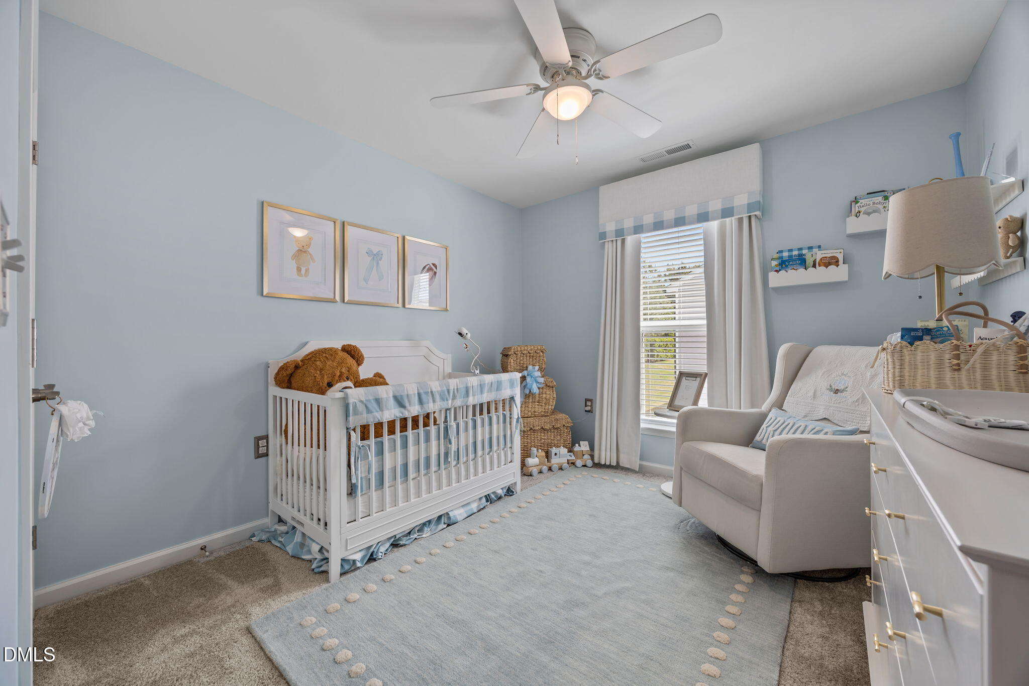 1108 Felman Road Durham, NC 27703 - Photo 20 of 28 a bedroom with furniture and a window