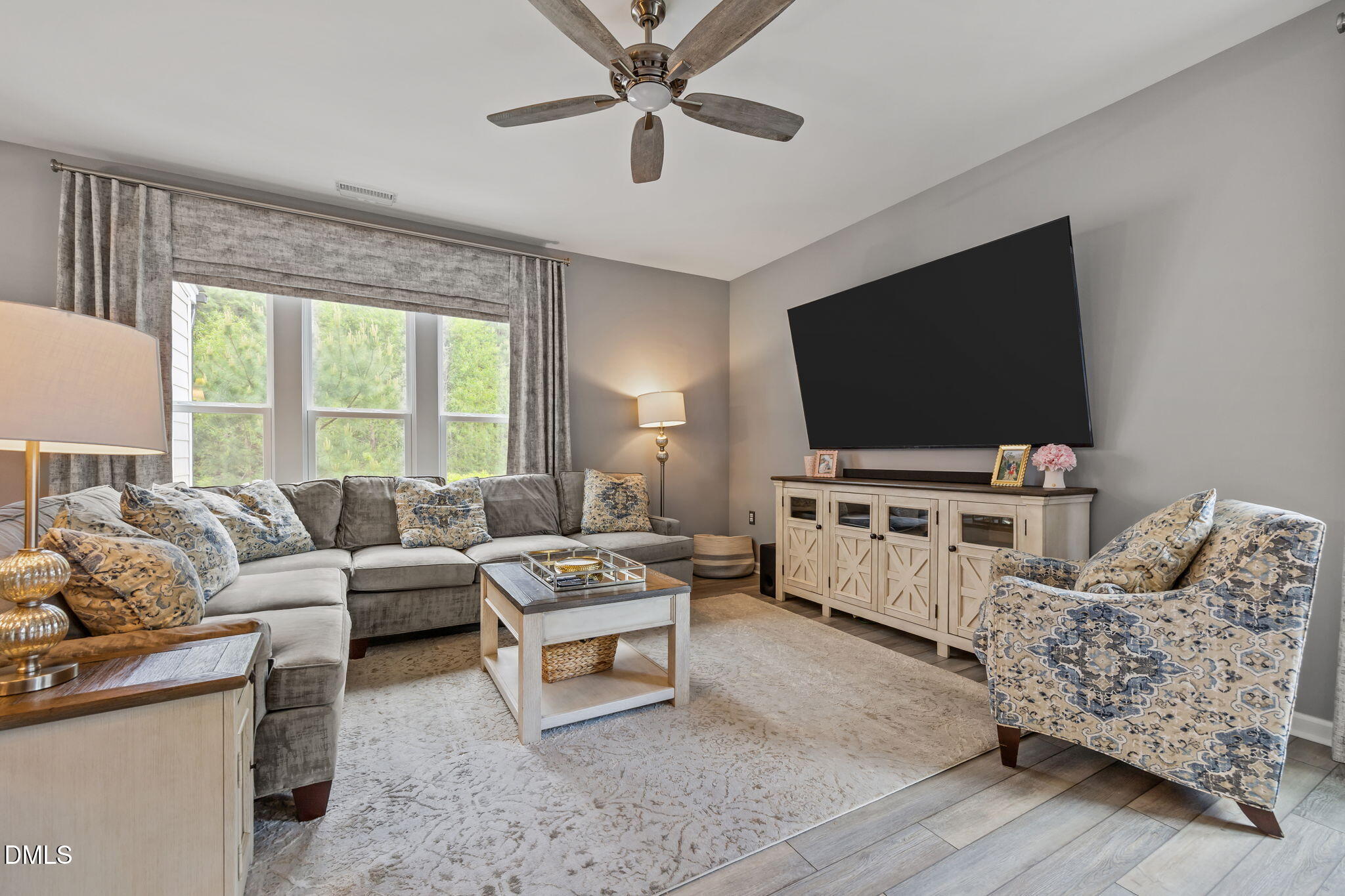 1108 Felman Road Durham, NC 27703 - Photo 2 of 28 a living room with furniture and a flat screen tv
