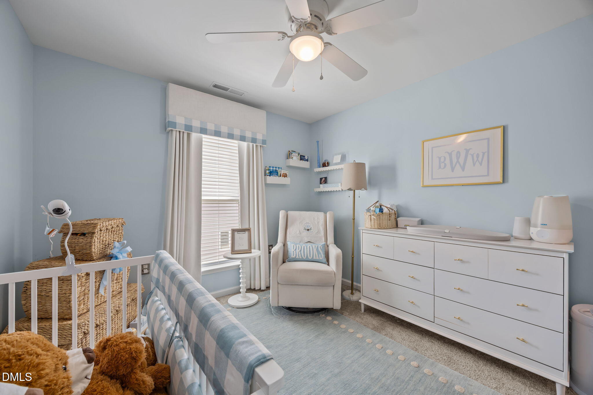 1108 Felman Road Durham, NC 27703 - Photo 21 of 28 a bedroom with furniture and a chandelier fan