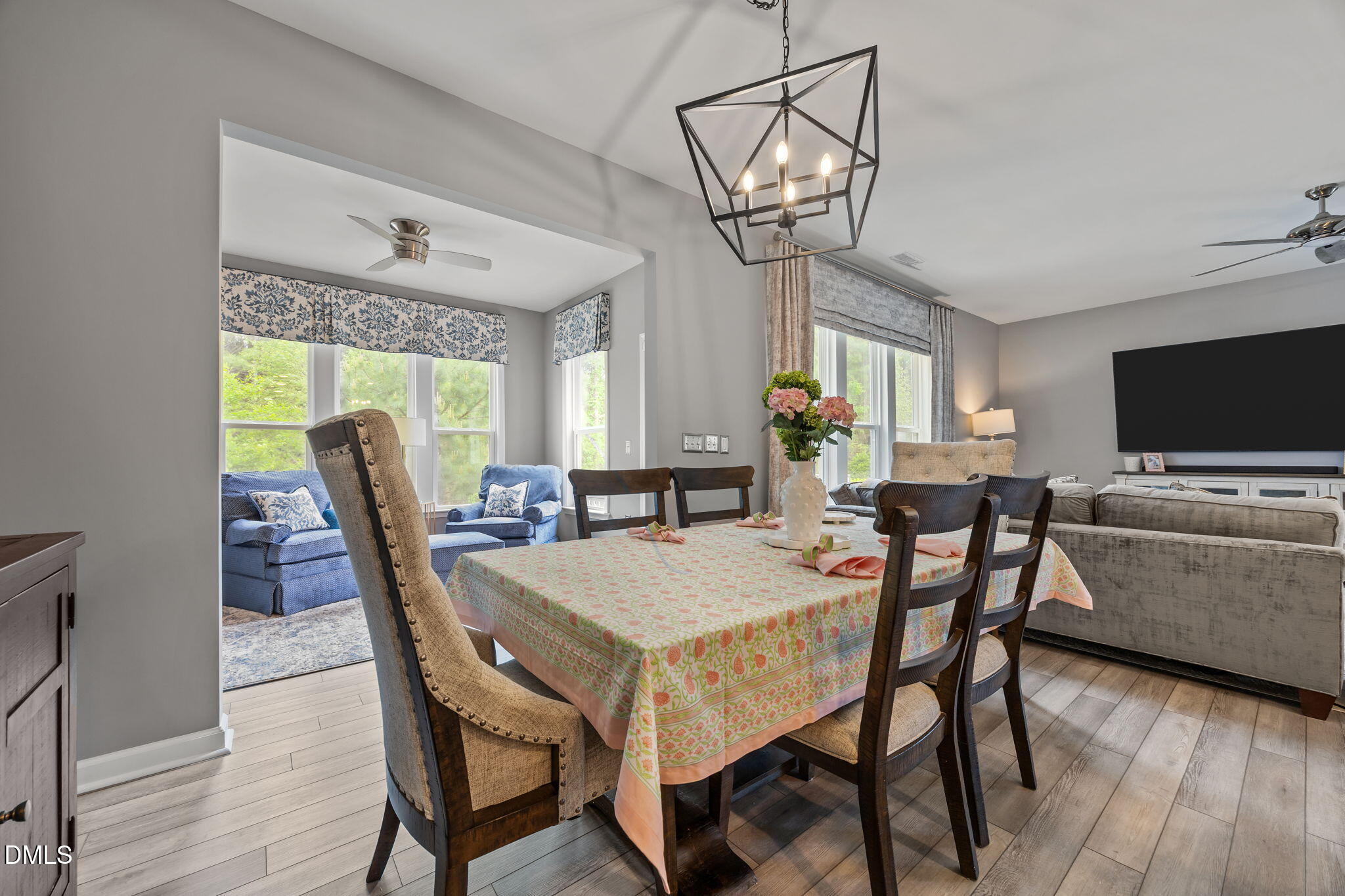 1108 Felman Road Durham, NC 27703 - Photo 6 of 28 a view of a dining room with furniture window and wooden floor