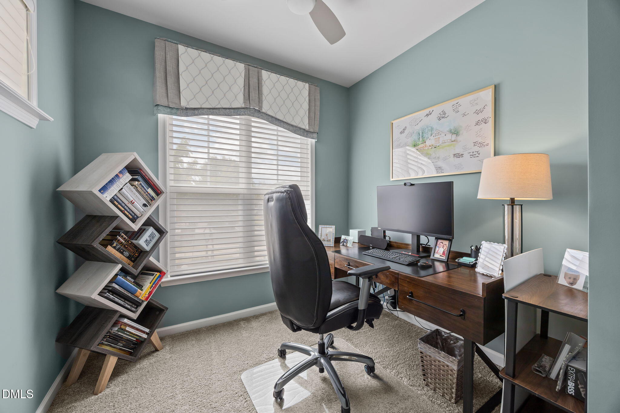 1108 Felman Road Durham, NC 27703 - Photo 9 of 28 a view of a workspace with furniture and a window