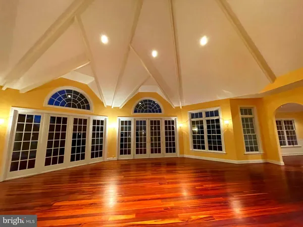a front view of a house with a large window