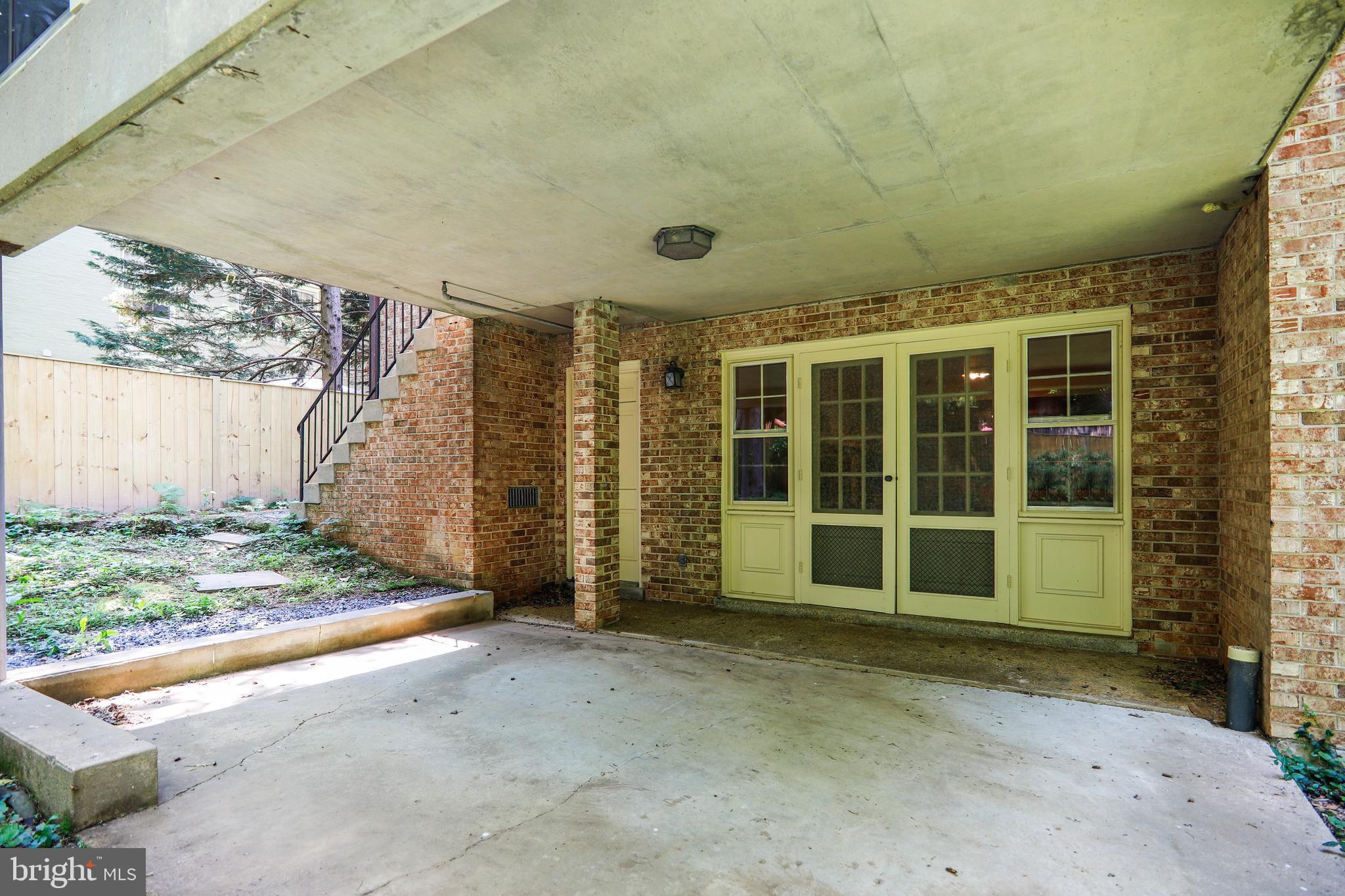 6003 Winnebago Road Bethesda, MD 20816 - Photo 68 of 81 Back-yard patio below screened porch