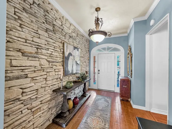a view of a hallway with entryway