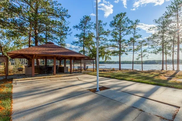 a view of a house with basketball court